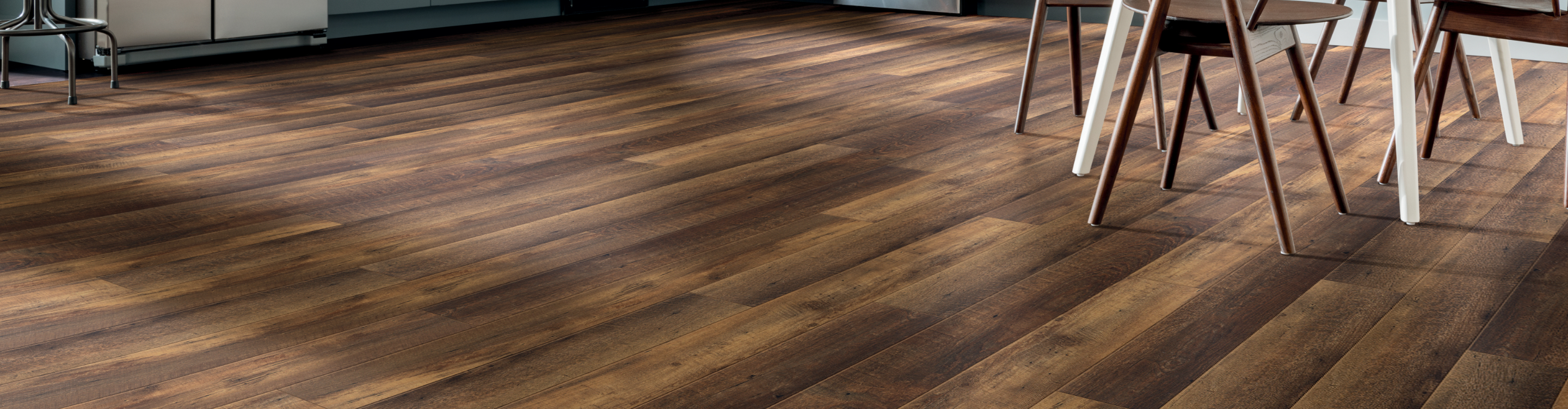 Dark Plank Vinyl Flooring in Kitchen Eating Area